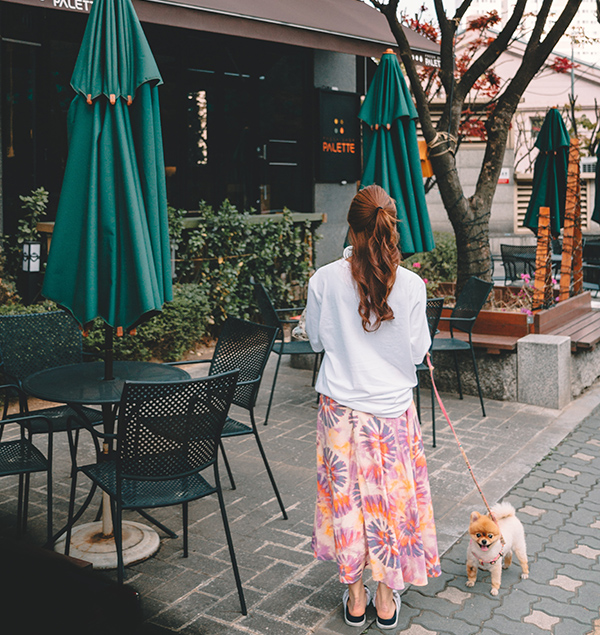 Woman and dog at cafe
